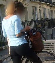 Sexy girl by her bicycle