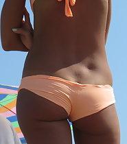Close look on hot tanned girl's ass
