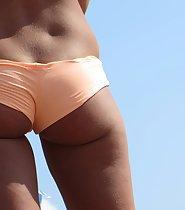 Close look on hot tanned girl's ass