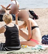 Spying on sexy friends on beach