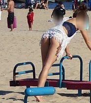 Fit hottie exercises on beach
