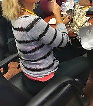 Hot milf sits and smiles