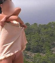 Nudist woman undressing