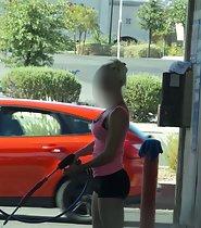 Busty girl washing cars