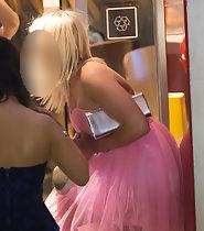 Upskirt of blond princess at party