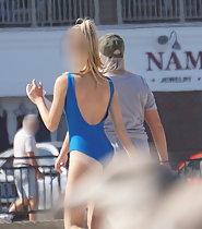 Hot girl in blue one piece swimsuit