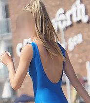Hot girl in blue one piece swimsuit