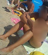 Beautiful topless girl at beach