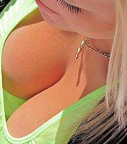 Smooth skin of perfect big boobs in closeup