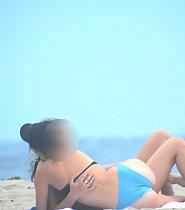 Horny teen lesbians surprised by beach voyeur
