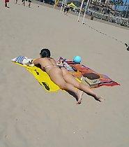 Juicy sunbathing ass in thong bikini