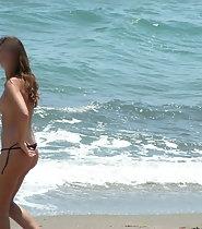 Spying on topless beauty on beach
