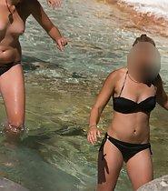 Stunning beach girl likes being topless