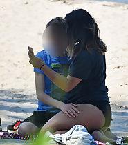 Peeping on boy with horny girl on beach
