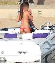 Smoking hot girl on speedboat