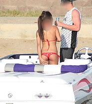 Smoking hot girl on speedboat
