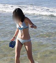 Hot girl enters water