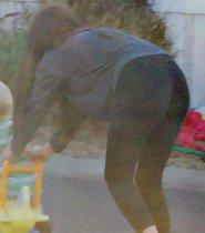 Young ass in tight black leggings