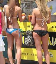 Sweet asses of two beach girls