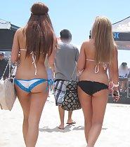 Sweet asses of two beach girls