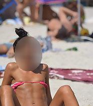 Beach girl shows lots of accidental nudity