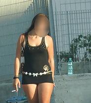 Street prostitute shows off