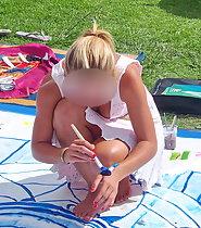 Busty girl plays in the park