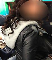 Curly beauty in a subway train