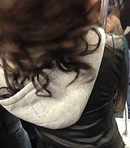 Curly beauty in a subway train