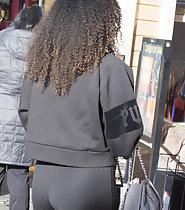 Curly girl got a nice big ass in tights