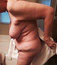 Fat mature woman showering