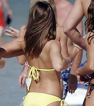 Cameltoe showing in yellow bikini