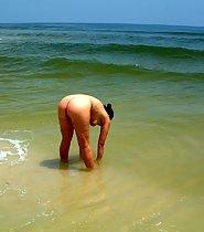 Naked milf on a beach