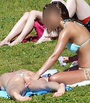 Teen girl massages friend's butt