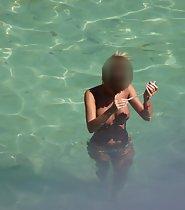 Amazing topless girl in the water
