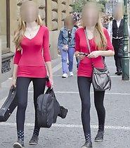 Skinny twin sisters in matching outfits