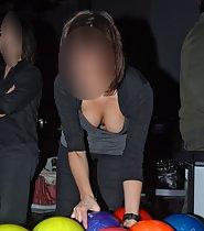 Bowling girl's big boobs slipping out