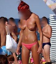 Tanned topless babe