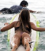 Spectacular surfer girl looks amazing