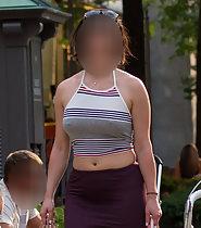 Classy woman with visible belly button