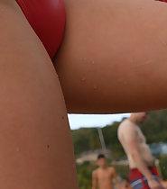 Young pussy bulge in red swimsuit