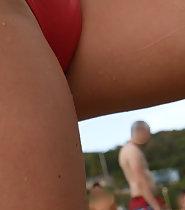 Young pussy bulge in red swimsuit