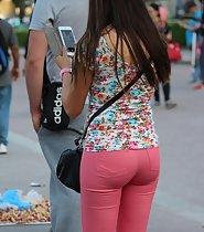 Adorable teen girl in pink pants
