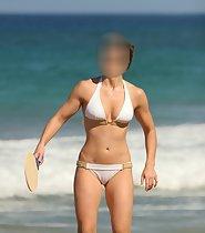 Woman plays on a beach