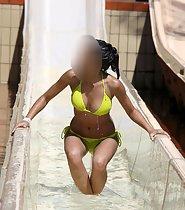 Busty girl on water slide