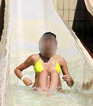 Busty girl on water slide