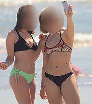 Beach girls snap a selfie to show off