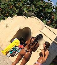 Tanned bubble butt in thong bikini