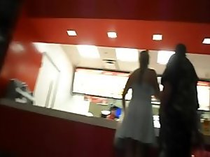 Checking her out at a fast food place
