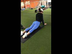 Flexible girl doing her stretching routine in the gym Picture 3